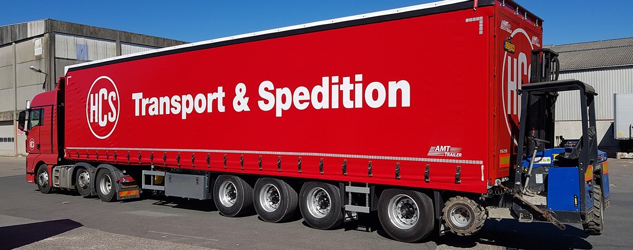 HCS tilbyder vejtransport i hele Europa - ekstra tung last med 4 akslet gardintrailer
